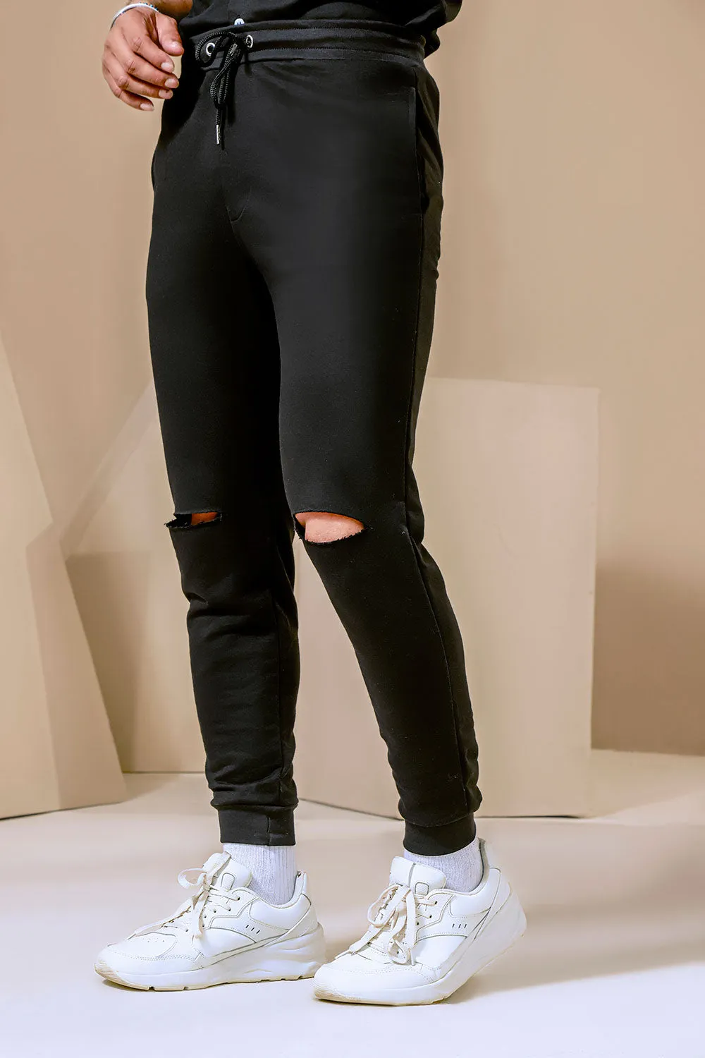 Black Jogger With Knee Rip Detail