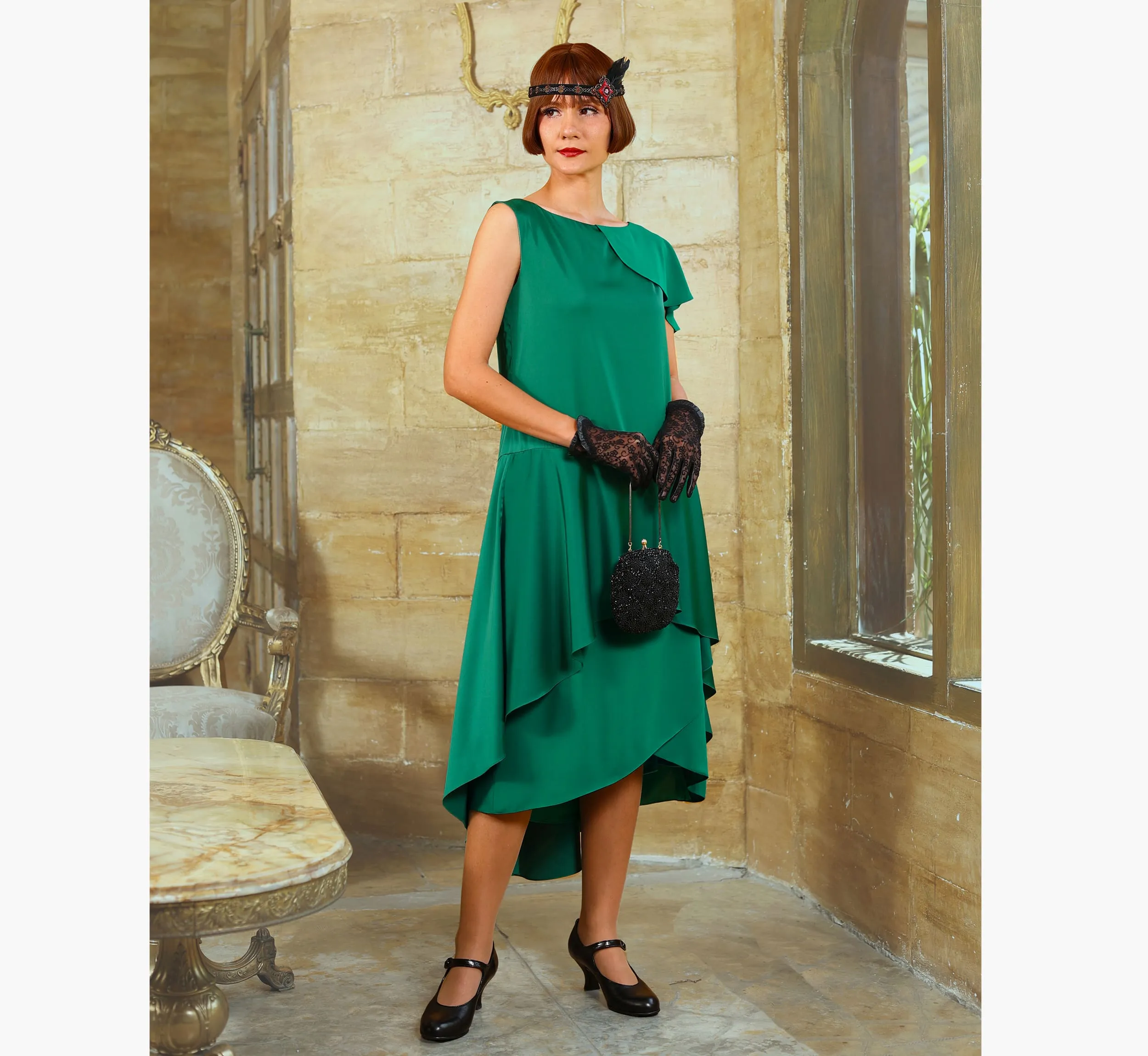 Green 1920s evening satin dress with a shoulder train