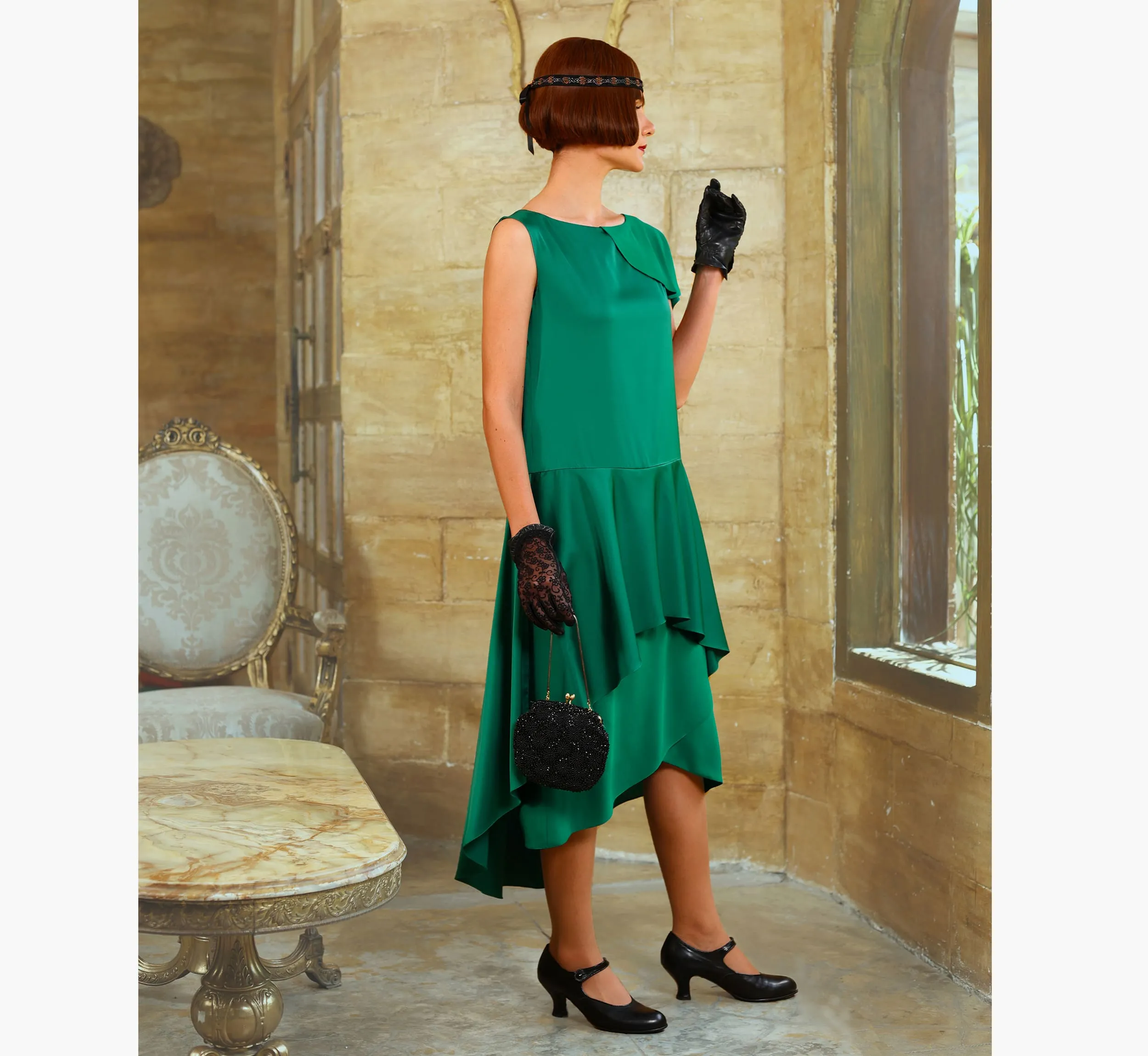 Green 1920s evening satin dress with a shoulder train
